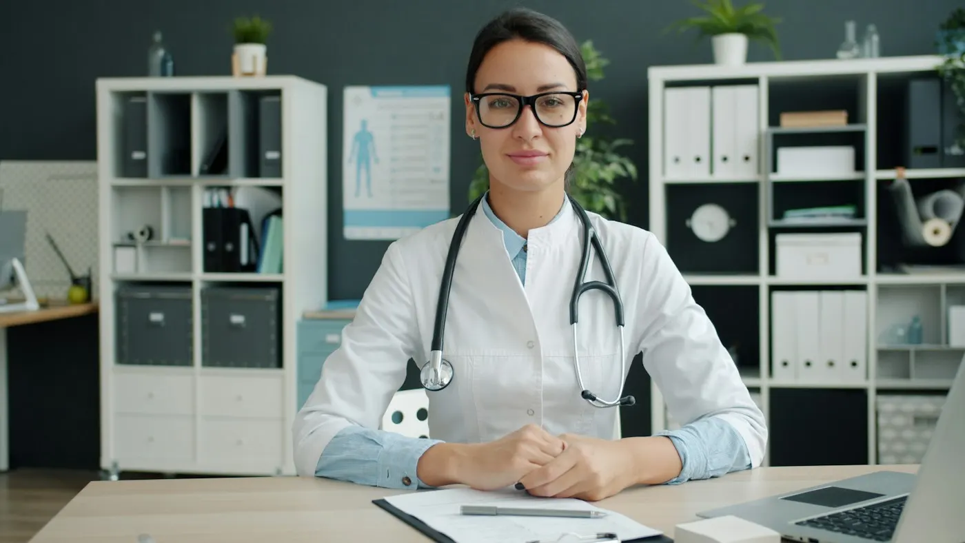 Dr. Meera Kulkarni at her desk